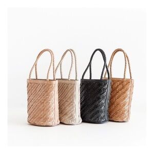 Woven leather petite bucket bag from Bembien in Sand.